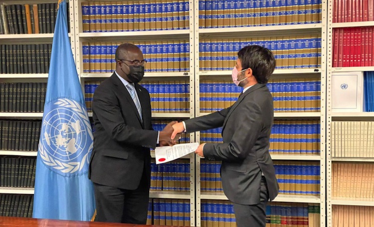 Photo: Lang Yabou, Permanent Representative of The Gambia to the UN, and David Nanopoulos, Chief of the Treaty Section of the UN Office of Legal Affairs.